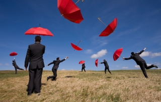 Businessmen Red Umbrellas Dr Lori Todd